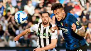 Inter overcome Udinese to stay on heels of leaders Milan