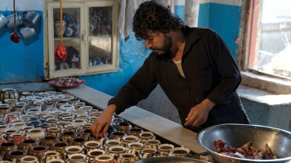 Afghan cook pours his heart into 'teapot' lamb stew 