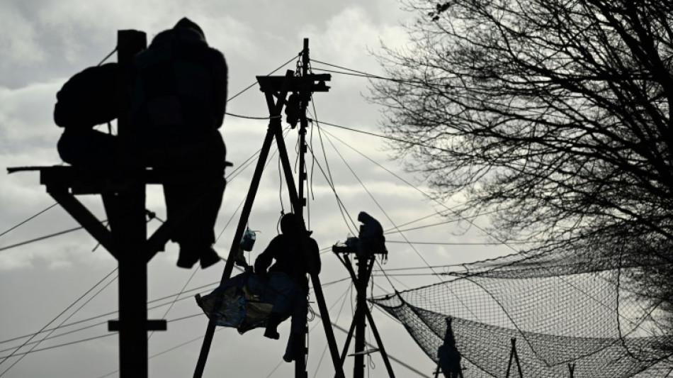 Anti-coal protesters dig in as German police clear protest camp