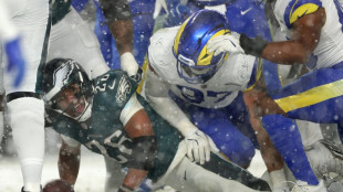 Barkley powers through the snow as Eagles beat Rams