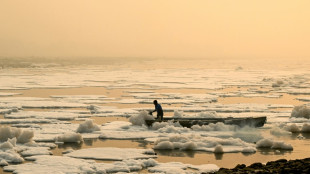 India's Hindus bathe in holy river defiled by pollution