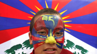 Tibetanos exilados se manifestam no 65° aniversário de seu levante fracassado