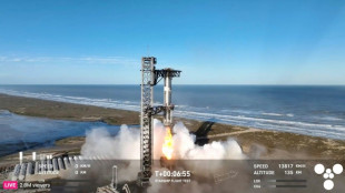 SpaceX catches Starship booster but upper stage explodes