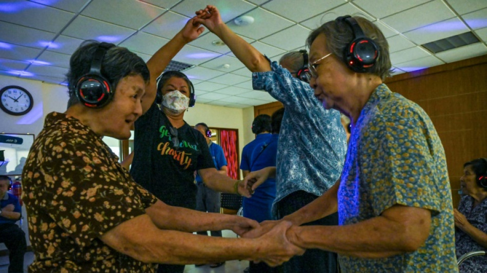 Singaporeans with dementia find their groove at silent disco