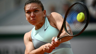 Panic attack derails former champion Halep at French Open