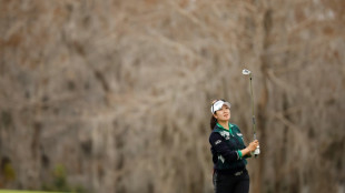 Kim holds on to lead at LPGA season-opener