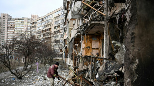 Ukrainian and Russian troops fight on streets of capital Kyiv