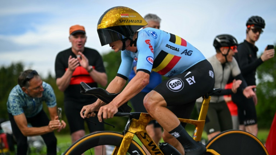 Belgian Evenepoel retains world title in 'toughest time trial'