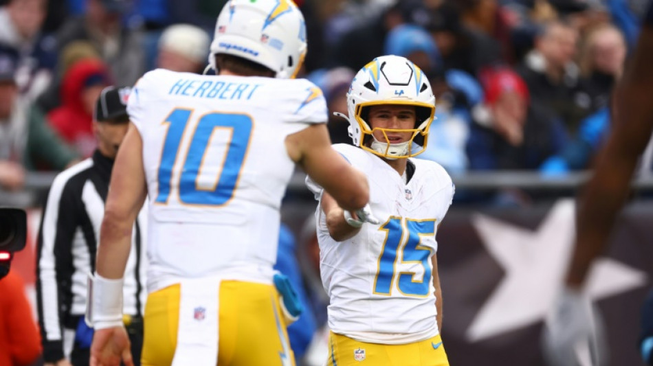 Impressive Herbert leads Chargers into playoffs, Broncos denied