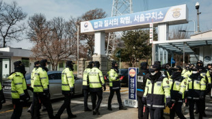 A mug shot and a solitary cell for S. Korea's impeached president