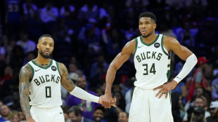 Bucks cruise past depleted Sixers to open NBA campaign