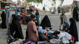 Afghan women defiant but feel 'imprisoned' by order to cover faces