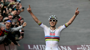 Pogacar remounts after fall and charges to Strade Bianche win