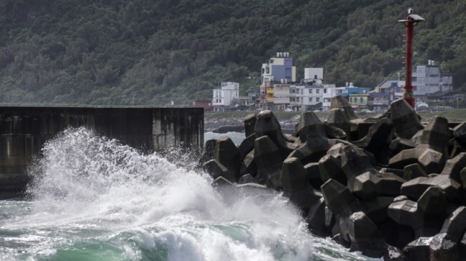 One person dead in Taiwan from Typhoon Koinu's record winds