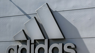 Adidas shares slide following China corruption claims