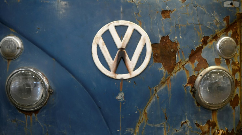 Volkswagen profit plunges on high costs, Chinese slump