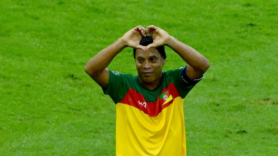Brazil's Ronaldinho stars in charity match for flood victims