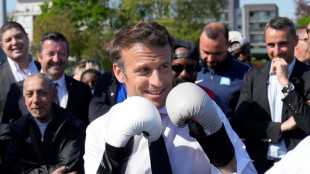 Macron appeals to 'stigmatised' suburbs in election push