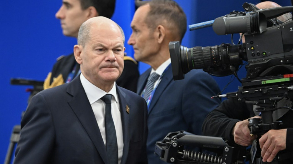 Germany's embattled Scholz open to talks on early election