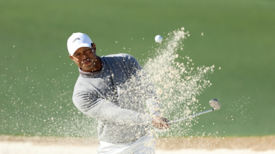 Tiger grinds to more Masters history as US stars fight for lead
