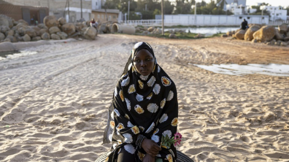 Flowers in the sand: families mourn Senegal migrants lost at sea