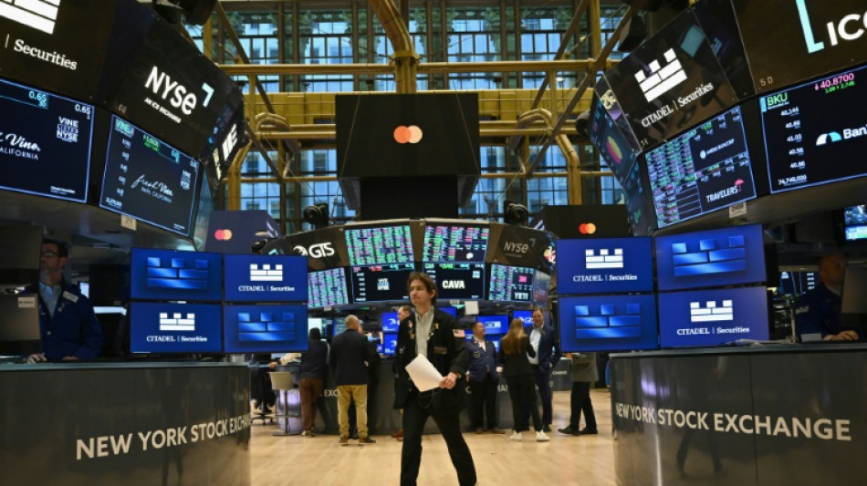 Wall Street termine en baisse, inquiète de la trajectoire de la Fed