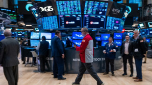 Wall Street finit en ordre dispersé, digère l'inflation