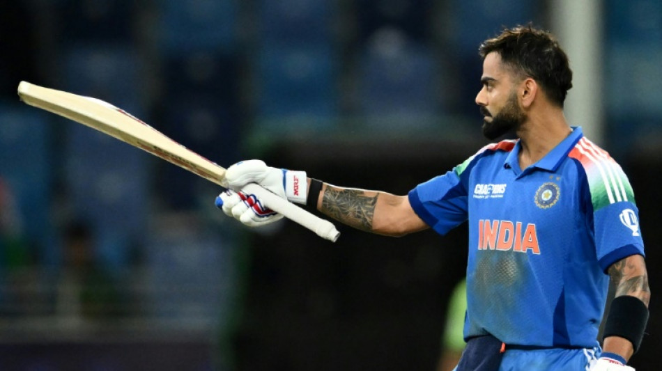 Kohli hits ton as India push Pakistan to brink of Champions Trophy exit