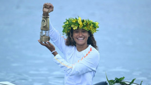 Olympic torch odyssey reaches the surf of Tahiti
