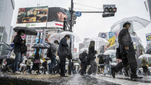 One dead, three missing in Japan after heavy rain