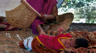 Flood-born: Nothing but mud as mother, infant return to Pakistan home