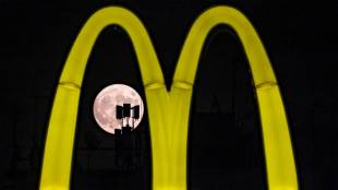 McDonald's profits dented by food poisoning outbreak