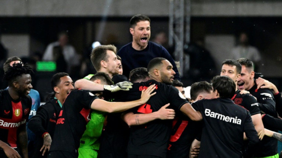 Xhaka scores as 10-man Leverkusen lift German Cup to claim a first double