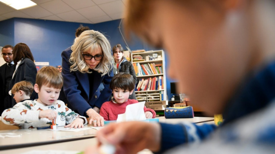 French first lady backs controversial school uniform